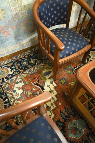 Rug styled under dining chairs