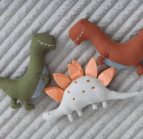 Fabric dinosaur soft toys